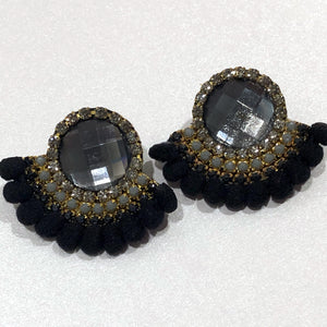 The Ceciel Abanico Earrings create an eye-catching look.  Looks great wether you dress it up or just wear it with a simple t-shirt. Earrings made with ​​the intricate soutache technique embroidery. They will come in a gift box.  Handmade with so much love and care using high quality materials. Unique piece. Swarovski crystals and silk tussel. Back is 14K Gold to avoid allergies. Lightweight