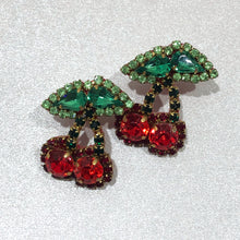 Load image into Gallery viewer, The Ceciel Cherries Earrings create an eye-catching look.  Looks great wether you dress it up or just wear it with a simple t-shirt. Earrings made with ​​the intricate soutache technique embroidery. They will come in a gift box.  Tropical Vibes Collection  Handmade with so much love and care using high quality materials. Unique piece. Swarovski crystals and silk tussel. Back is 14K Gold to avoid allergies. Lightweight
