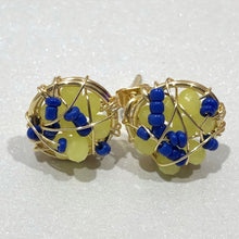 Load image into Gallery viewer, The Ceciel Ella Earrings create an eye-catching look.  Looks great wether you dress it up or just wear it with a simple t-shirt. They will come in a gift box.  Gold Chic Collection.  Handmade with so much love and care using high quality materials. Unique piece. Swarovski crystals Back is 14K Gold to avoid allergies. Lightweight Gold wire wrap
