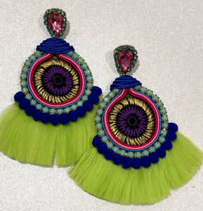 The Ceciel Farah Earrings create an eye-catching look. Looks great wether you dress it up or just wear it with a simple t-shirt. Earrings made with ​​the intricate soutache technique embroidery. They will come in a gift box. Handmade with so much love and care using high quality materials. Unique piece. Silk ribbons, Swarovski crystals and silk tussel. Back is 14K Gold to avoid allergies. Lightweight