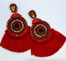 Load image into Gallery viewer, The Ceciel Farah Earrings create an eye-catching look. Looks great wether you dress it up or just wear it with a simple t-shirt. Earrings made with ​​the intricate soutache technique embroidery. They will come in a gift box. Handmade with so much love and care using high quality materials. Unique piece. Silk ribbons, Swarovski crystals and silk tussel. Back is 14K Gold to avoid allergies. Lightweight
