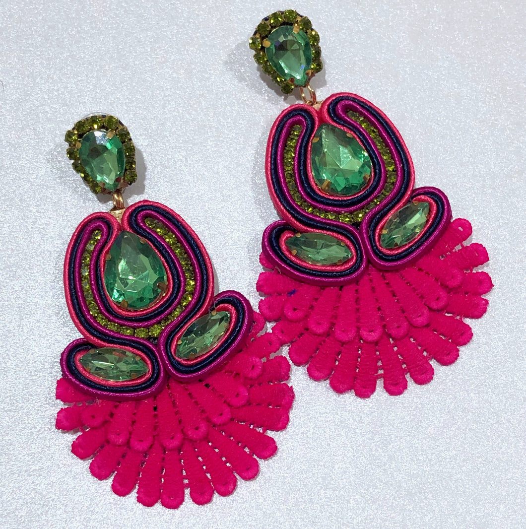 The Ceciel Iris Earrings create an eye-catching look.  Looks great wether you dress it up or just wear it with a simple t-shirt. Earrings made with ​​the intricate soutache technique embroidery. They will come in a gift box.  Handmade with so much love and care using high quality materials. Unique piece. Swarovski crystals and silk tussel. Back is 14K Gold to avoid allergies. Lightweight