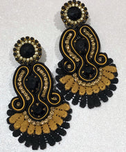 Load image into Gallery viewer, The Ceciel Iris Chic Earrings create an eye-catching look.  Looks great wether you dress it up or just wear it with a simple t-shirt. Earrings made with ​​the intricate soutache technique embroidery. They will come in a gift box.  Handmade with so much love and care using high quality materials. Unique piece. Swarovski crystals and silk tussel. Back is 14K Gold to avoid allergies. Lightweight
