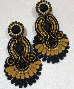 The Ceciel Iris Chic Earrings create an eye-catching look.  Looks great wether you dress it up or just wear it with a simple t-shirt. Earrings made with ​​the intricate soutache technique embroidery. They will come in a gift box.  Handmade with so much love and care using high quality materials. Unique piece. Swarovski crystals and silk tussel. Back is 14K Gold to avoid allergies. Lightweight