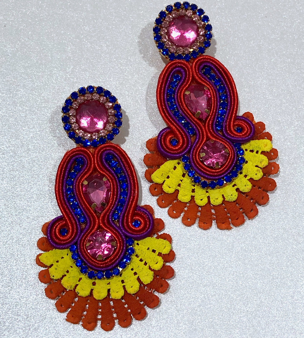 The Ceciel Iris Chic Earrings create an eye-catching look.  Looks great wether you dress it up or just wear it with a simple t-shirt. Earrings made with ​​the intricate soutache technique embroidery. They will come in a gift box.  Handmade with so much love and care using high quality materials. Unique piece. Swarovski crystals and silk tussel. Back is 14K Gold to avoid allergies. Lightweight