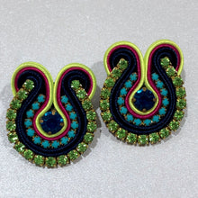 Load image into Gallery viewer, The Ceciel Kate Earrings create an eye-catching look.  Looks great wether you dress it up or just wear it with a simple t-shirt. Earrings made with ​​the intricate soutache technique embroidery. They will come in a gift box.  Handmade with so much love and care using high quality materials. Unique piece. Swarovski crystals and silk tussel. Back is 14K Gold to avoid allergies. Lightweight
