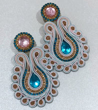 Load image into Gallery viewer, The Ceciel Lola Earrings create an eye-catching look.  Looks great wether you dress it up or just wear it with a simple t-shirt. Earrings made with ​​the intricate soutache technique embroidery. They will come in a gift box.  Handmade with so much love and care using high quality materials. Unique piece. Swarovski crystals and silk tussel. Back is 14K Gold to avoid allergies. Lightweight
