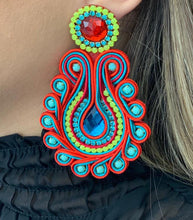 Load image into Gallery viewer, The Ceciel Lola Earrings create an eye-catching look.  Looks great wether you dress it up or just wear it with a simple t-shirt. Earrings made with ​​the intricate soutache technique embroidery. They will come in a gift box.  Handmade with so much love and care using high quality materials. Unique piece. Swarovski crystals and silk tussel. Back is 14K Gold to avoid allergies. Lightweight
