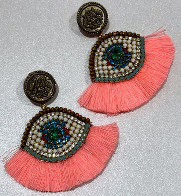 The Ceciel Lucky Eye Earrings create an eye-catching look.  Looks great wether you dress it up or just wear it with a simple t-shirt. Earrings made with ​​the intricate soutache technique embroidery. They will come in a gift box.  Handmade with so much love and care using high quality materials. Unique piece. Swarovski crystals and silk tussel. Back is 14K Gold to avoid allergies. Lightweight