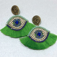 Load image into Gallery viewer, The Ceciel Lucky Eye Earrings create an eye-catching look.  Looks great wether you dress it up or just wear it with a simple t-shirt. Earrings made with ​​the intricate soutache technique embroidery. They will come in a gift box.  Handmade with so much love and care using high quality materials. Unique piece. Swarovski crystals and silk tussel. Back is 14K Gold to avoid allergies. Lightweight
