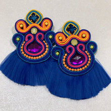 Load image into Gallery viewer, The Ceciel Macarena Earrings create an eye-catching look.  Looks great wether you dress it up or just wear it with a simple t-shirt. Earrings made with ​​the intricate soutache technique embroidery. They will come in a gift box.  Handmade with so much love and care using high quality materials. Unique piece. Swarovski crystals and silk tussel. Back is 14K Gold to avoid allergies. Lightweight
