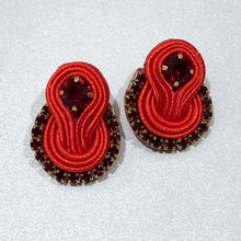 Load image into Gallery viewer, The Ceciel Rose Earrings create an eye-catching look.  Looks great wether you dress it up or just wear it with a simple t-shirt. Earrings made with ​​the intricate soutache technique embroidery. They will come in a gift box.  Handmade with so much love and care using high quality materials. Unique piece. Swarovski crystals and silk tussel. Back is 14K Gold to avoid allergies. Lightweight
