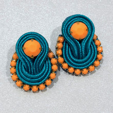 Load image into Gallery viewer, The Ceciel Rose Earrings create an eye-catching look.  Looks great wether you dress it up or just wear it with a simple t-shirt. Earrings made with ​​the intricate soutache technique embroidery. They will come in a gift box.  Handmade with so much love and care using high quality materials. Unique piece. Swarovski crystals and silk tussel. Back is 14K Gold to avoid allergies. Lightweight
